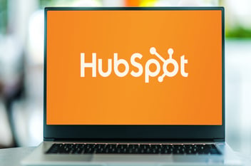 laptop with hubspot logo